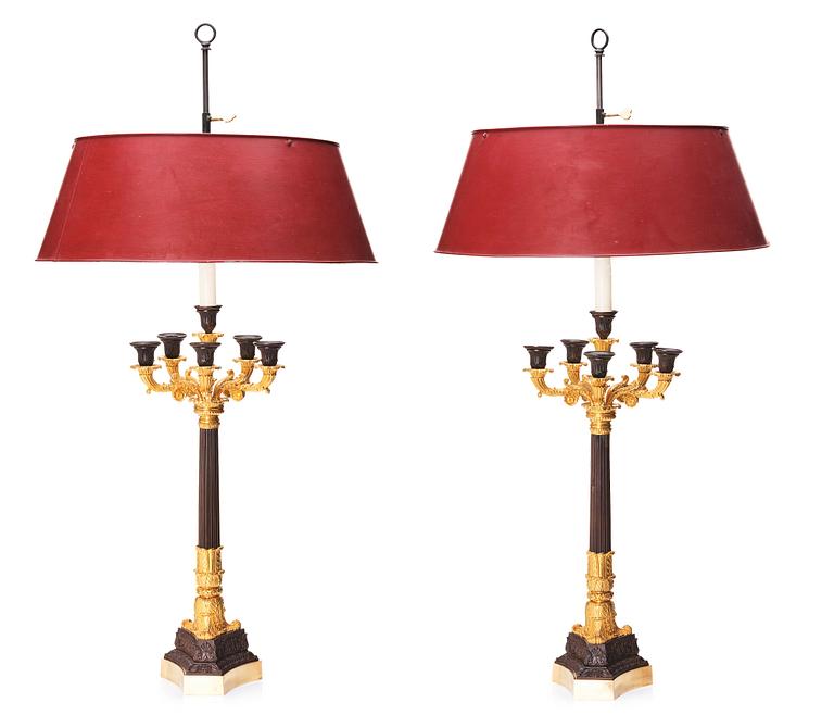 A pair of French Louis Philippe six light candelabra, around 1830.