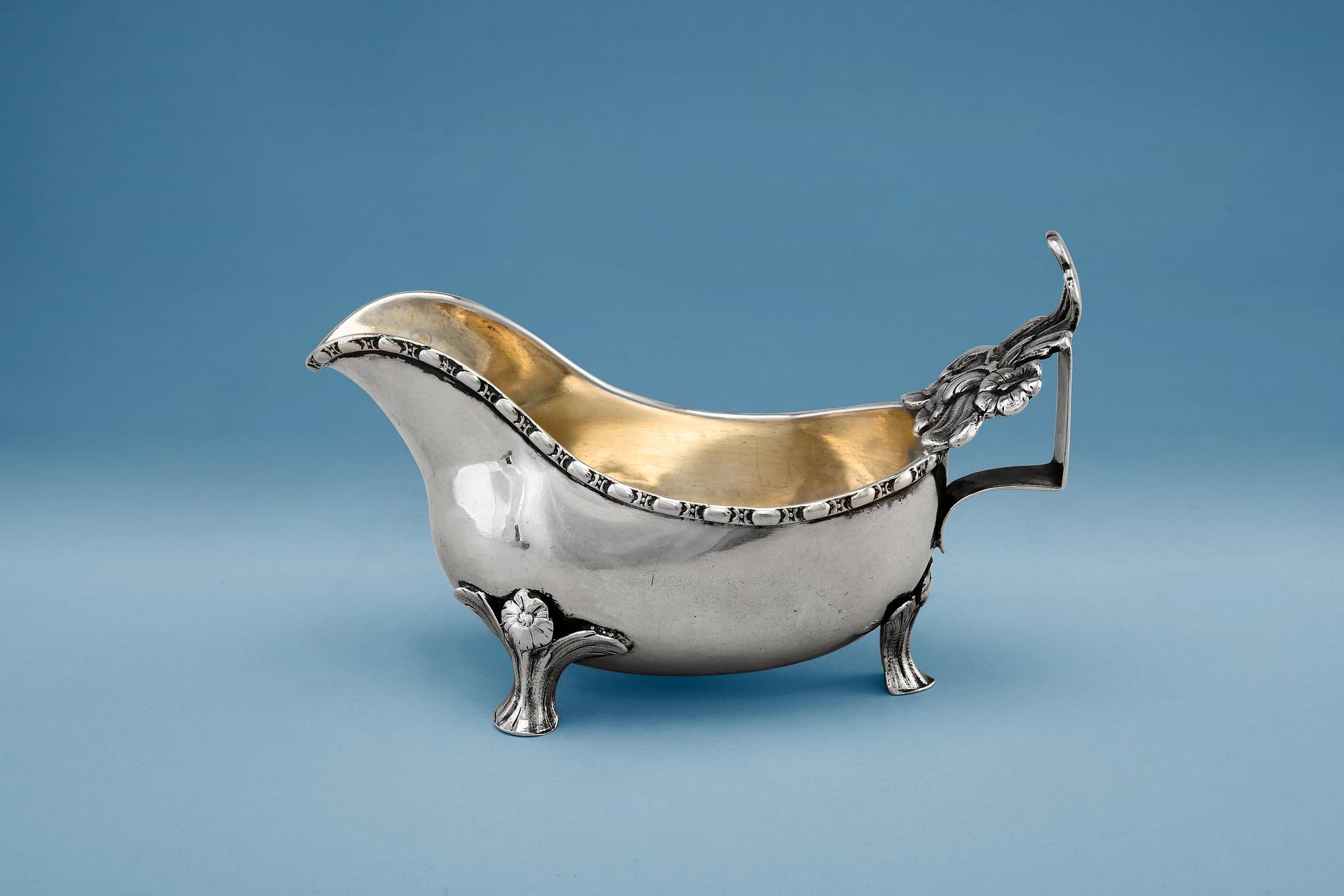 A CREAMER, silver, rococo. Petter Eneroth Stockholm 1783. Gilt inside. Length 17 cm, weight 217 g.