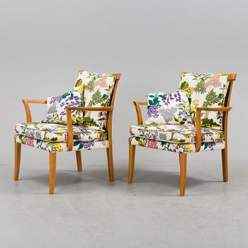 A pair of Norell easy chairs, 20th century.