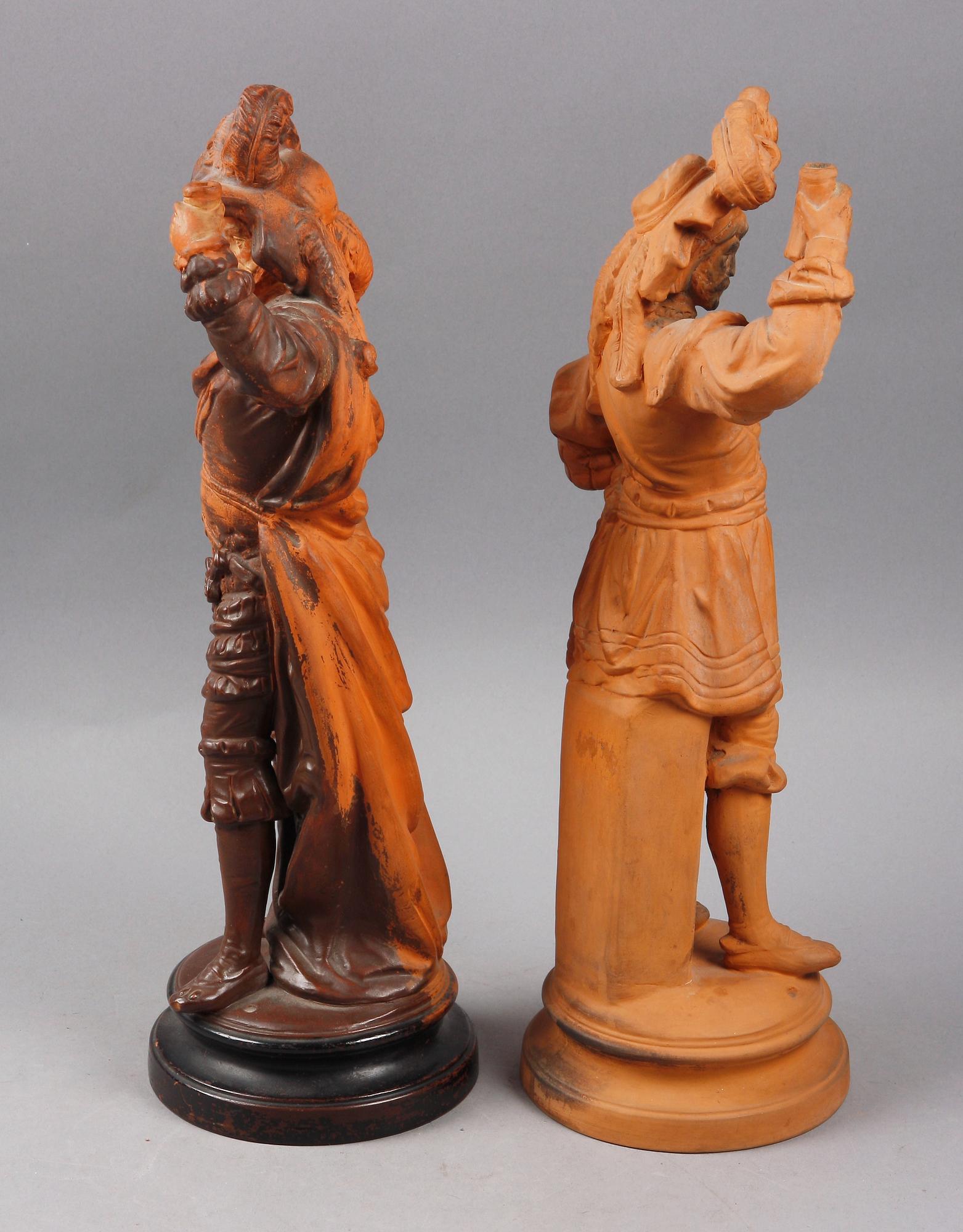 FIGURINER, ett par, terrakotta. UFFRECHT & CO, Tyskland, 1800/1900-tal.