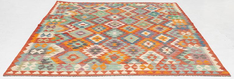 A kilim carpet, c. 295 x 203.