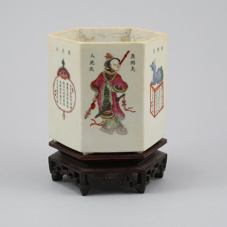 A famille rose hexagonal figure scene brushpot, Qing dynasty, 19th Century.