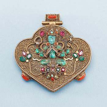 1564. A filigree and jewelled Sinotibetan pendant/box, late 19th Century.