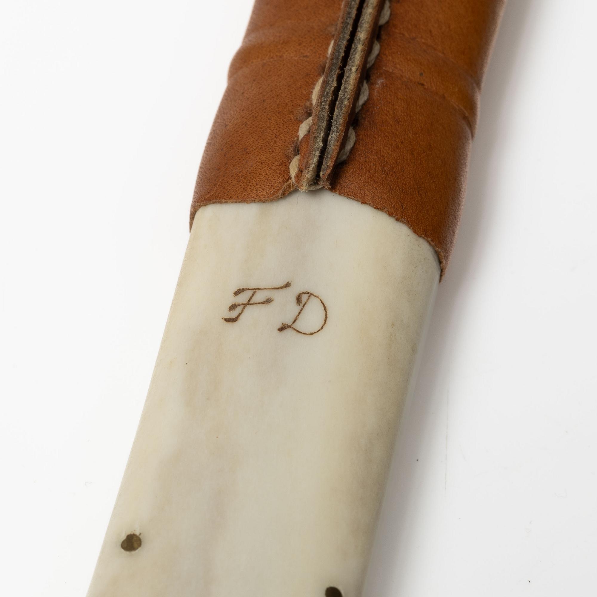Half-horn knife, signed.