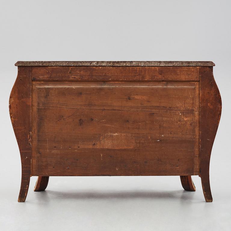 A Swedish Rococo commode, veneered with rosewood and amaranth.