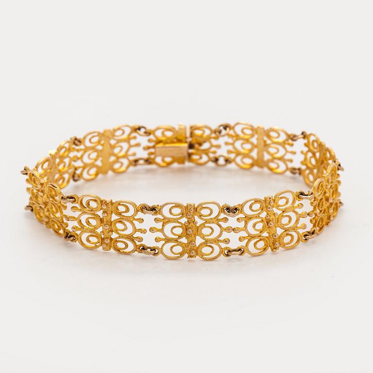 Esko Raitanen, collier, armband och örhängen, 14K guld, Helsingfors 1972.