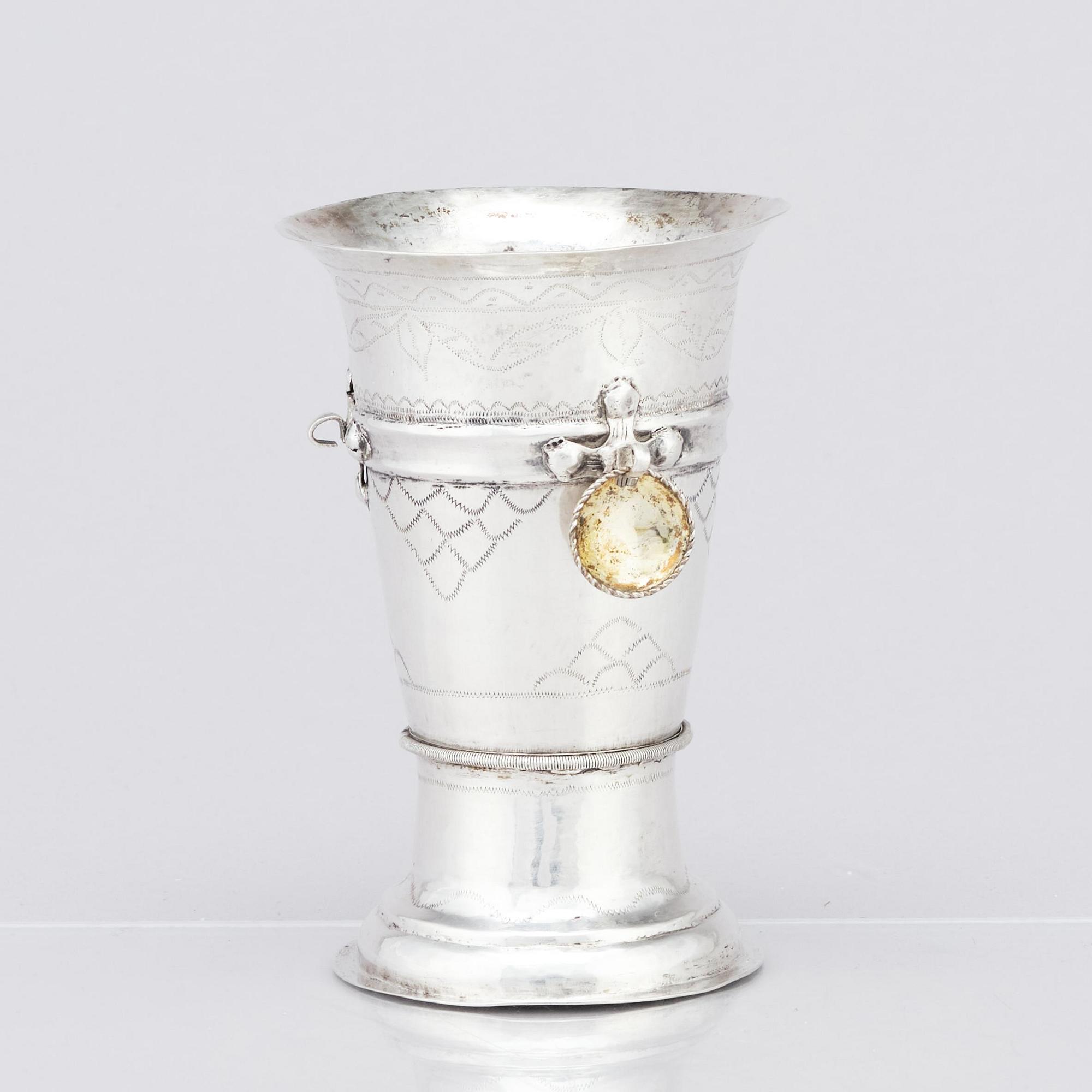 An 18th century silver beaker, unidentified makers mark.