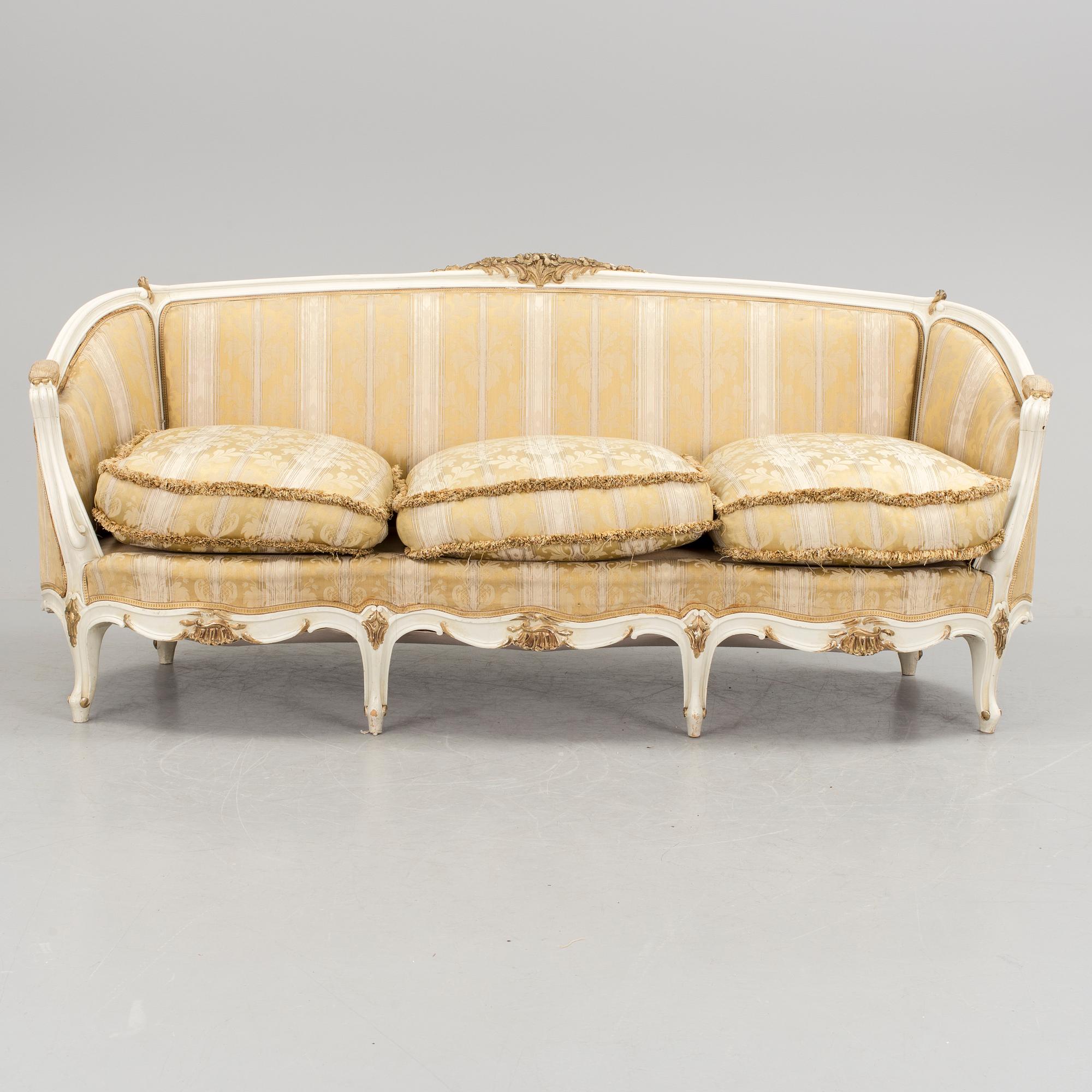 a 1930s rococo style sofa.