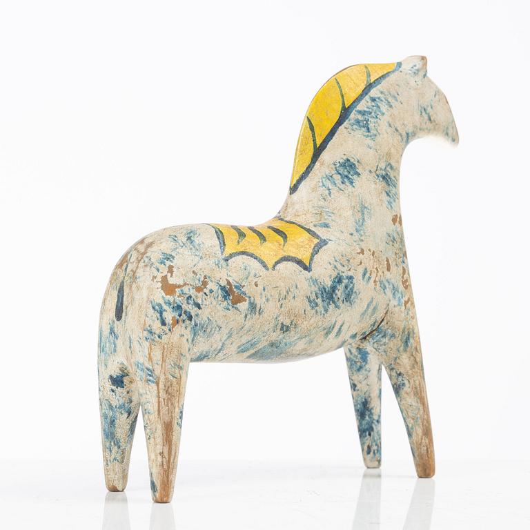 A carved and polychrome painted Dalecarlian horse, circa 1900.