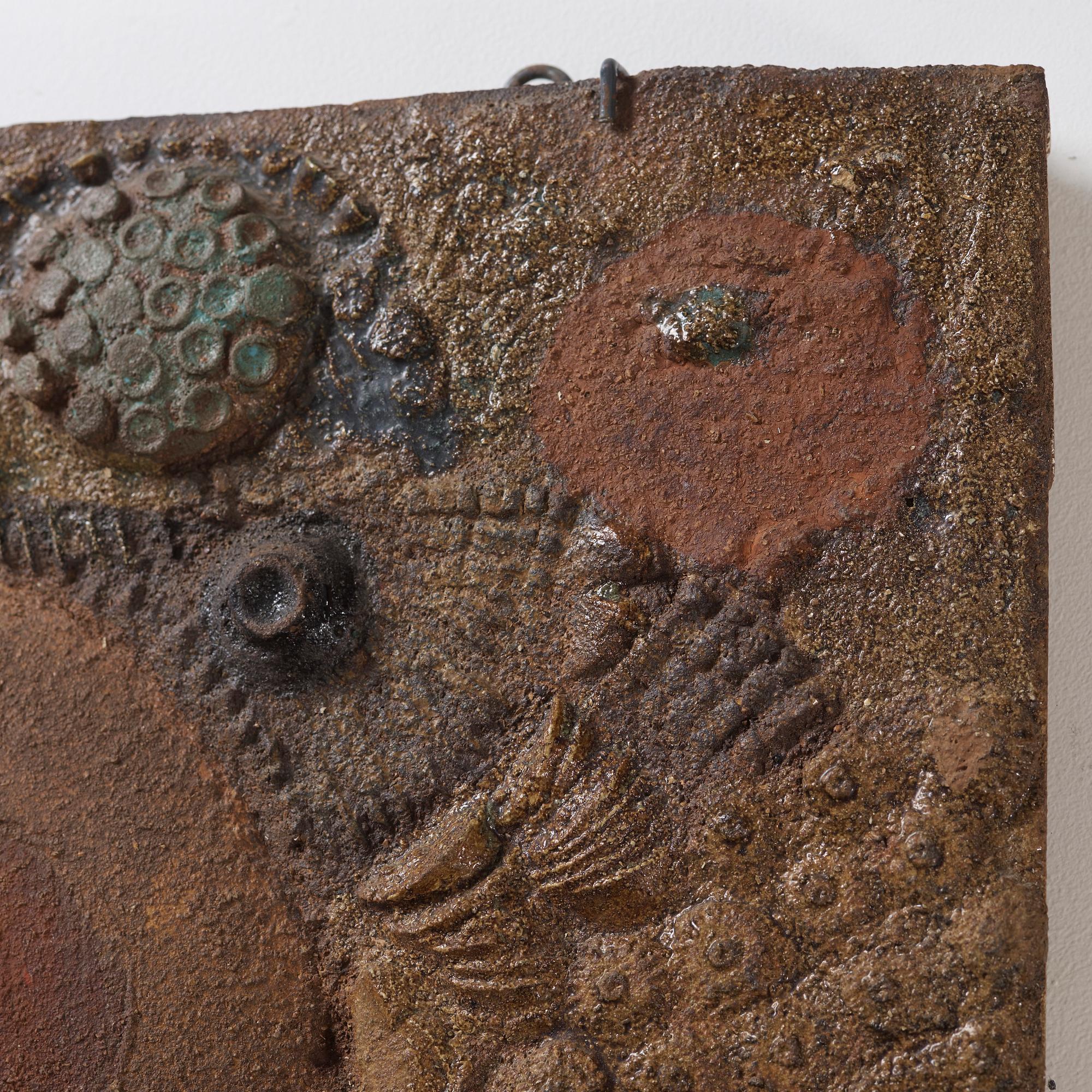 A Stig Lindberg stoneware relief, Gustavsberg studio, Sweden probably 1960's.