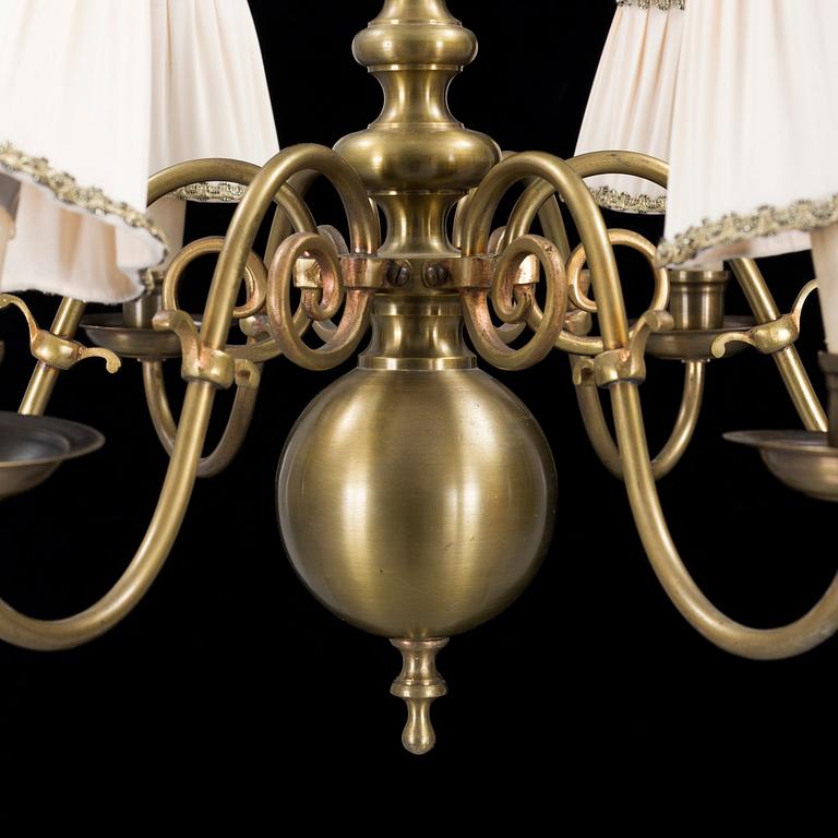 A 20th century baroque style brass ceiling light.