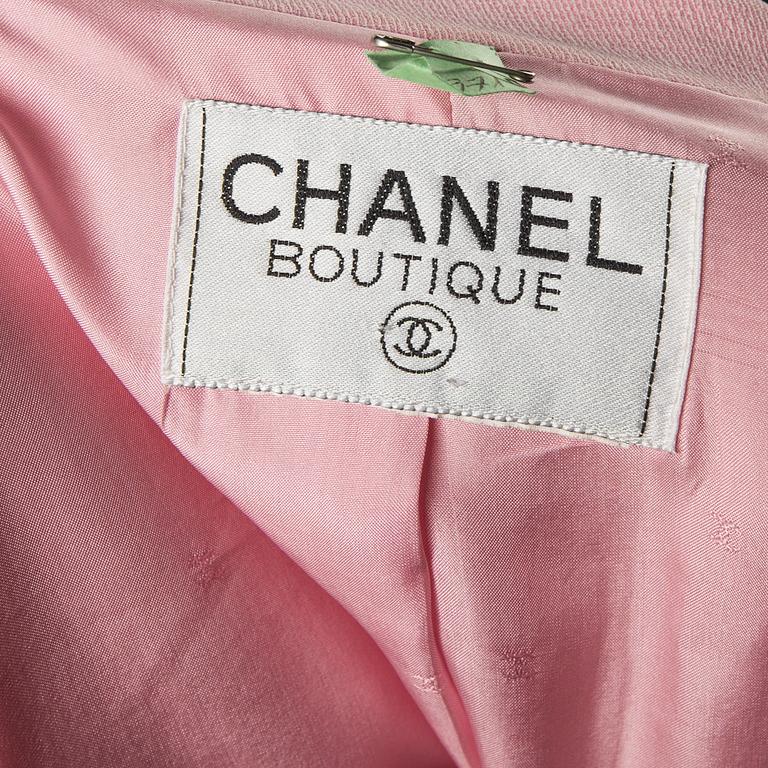 A suit by CHANEL.