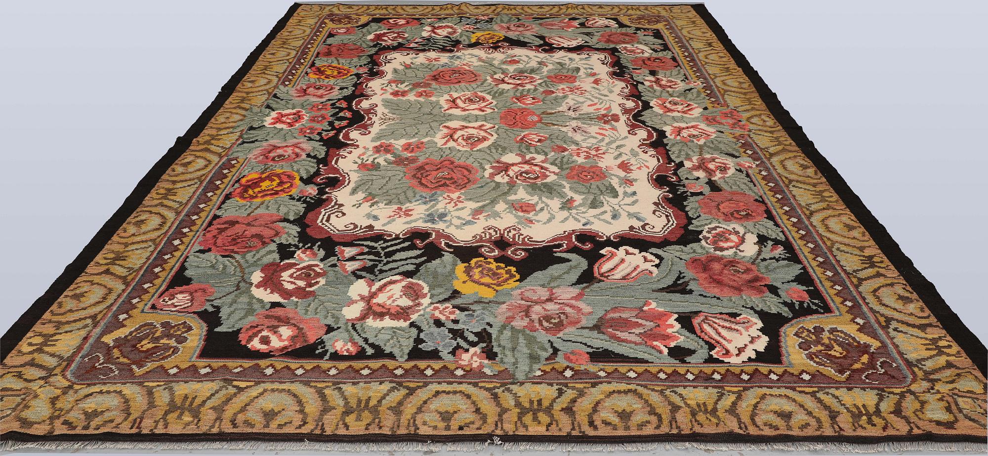 An older Bessarabian Kelim carpet, 380 x 240 cm.