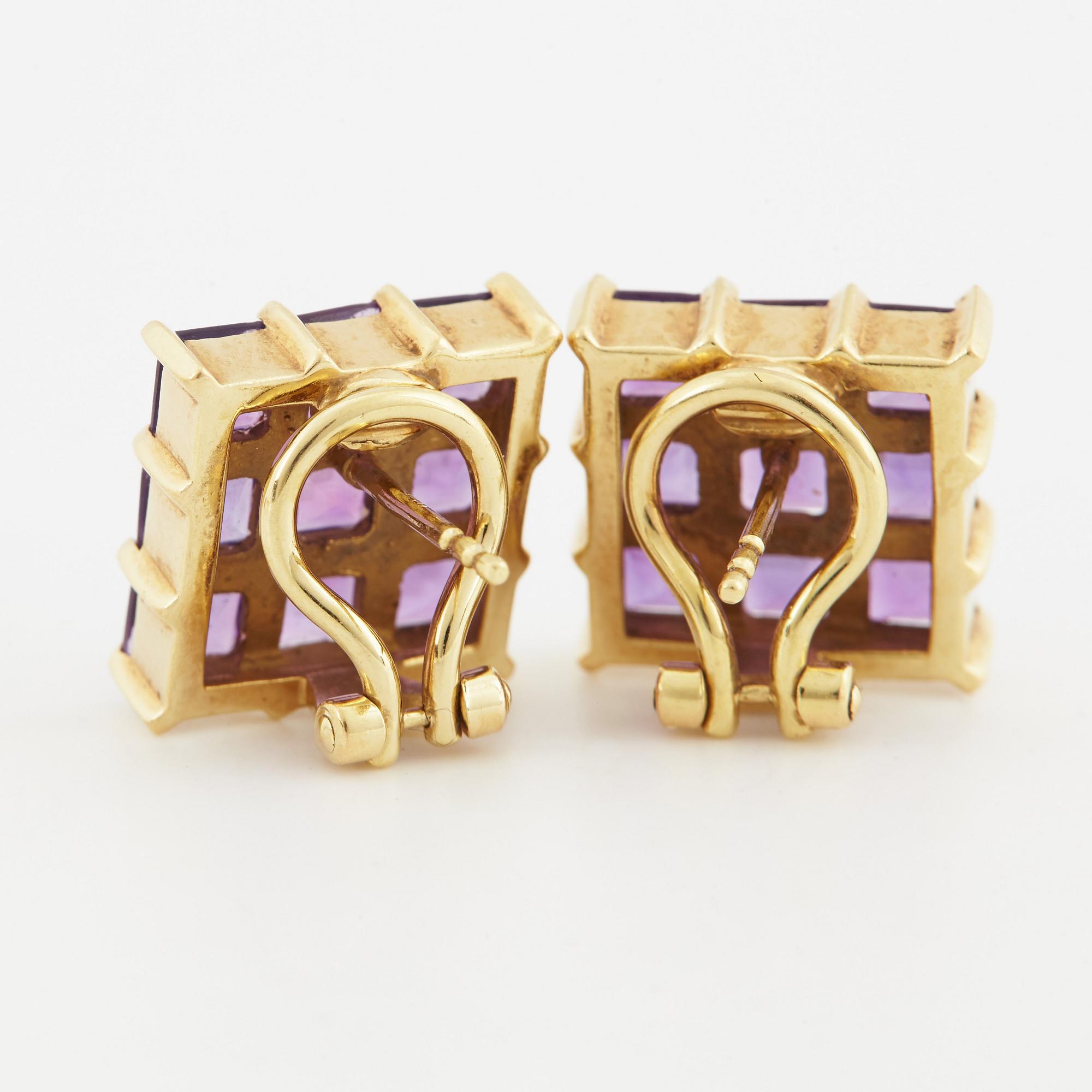 Breuning, a pair of earrings, a pendant and a ring.