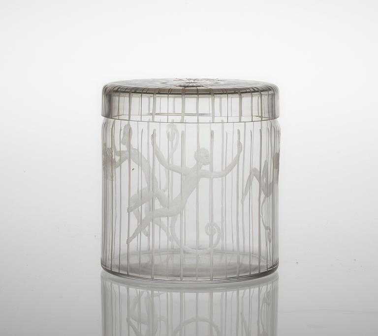 An Edward Hald engraved glass jar with cover, Orrefors 1951.