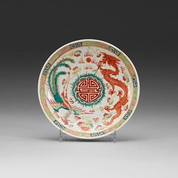 A set of three phoenix and dragon famille rose dish, Qing dynasty with Guangxu six character mark and period (1875-1908).