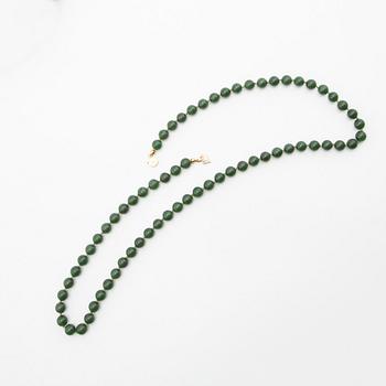 Collier, grön sten och lås i 14K guld.