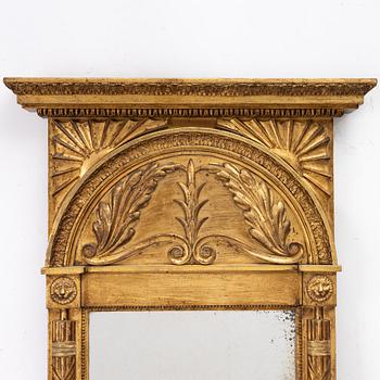 An Empire giltwood mirror by C. G. Hafström (master in Stockholm 1795-1815).