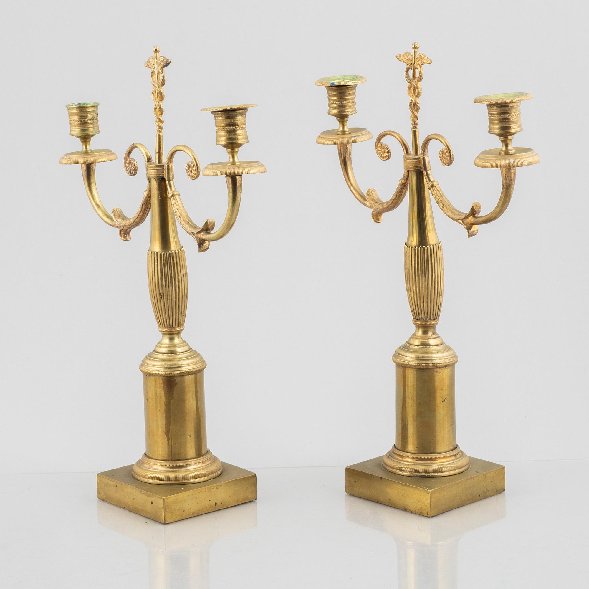 A pair of brass candelabra, first half/mid 19th century.
