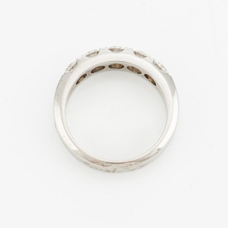 Ring with five brilliant-cut diamonds.