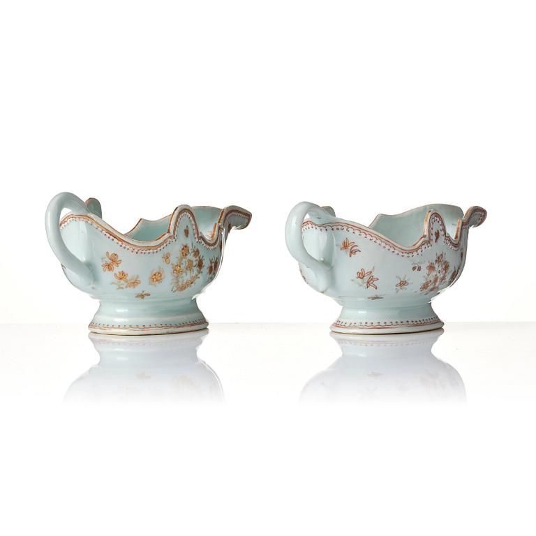 A set of two iron red and gold sauce boats, Qing dynasty, Qianlong (1736-95).
