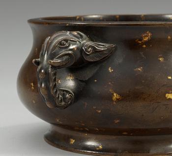 A gold splashed bronze censer and stand, Qing dynasty, 17/18th Century, with Xuande´s seal mark.