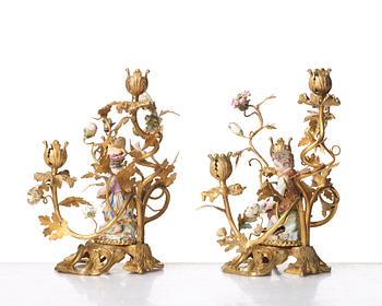 A pair of Meissen Rococo-style three-light candelabra, second half of the 1800's.