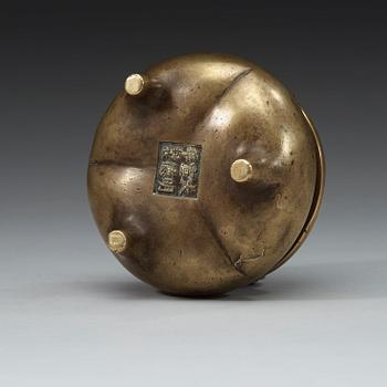 A bronze tripod censer, Qing dynasty, 19th Century.