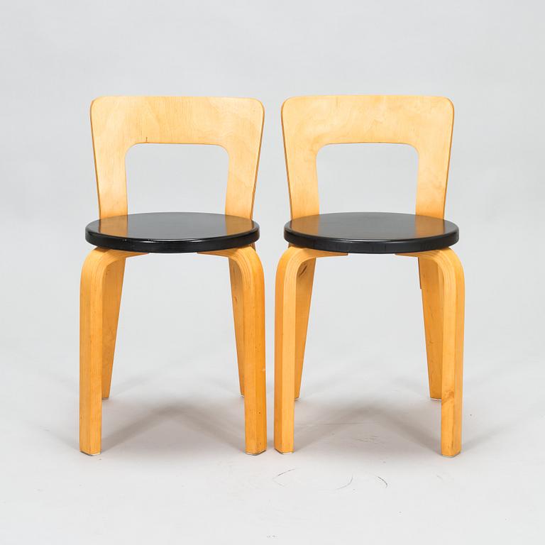 Alvar Aalto, four 1950s chairs, model 65, Artek.