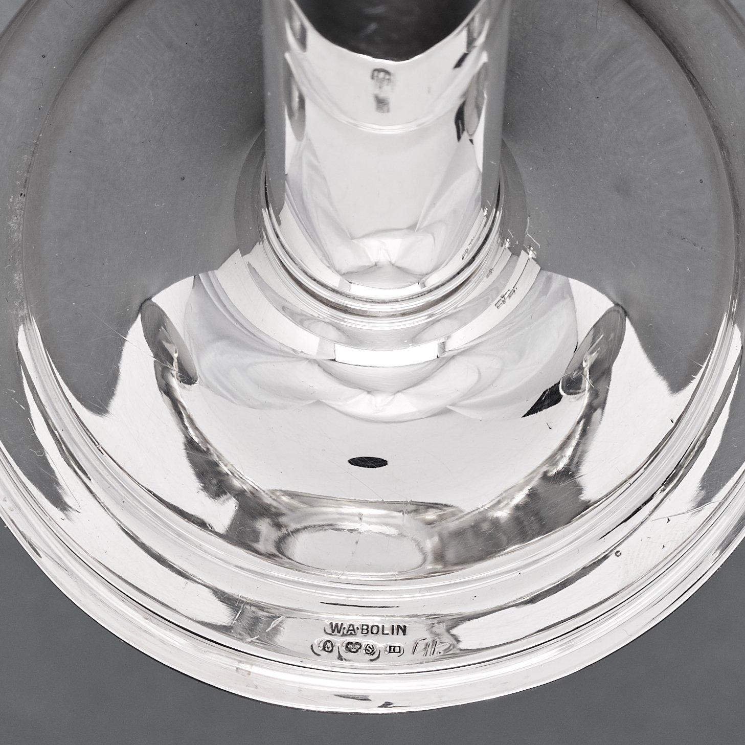 W.A Bolin, a pair of two branched silver candelabra, Stockholm 1935.