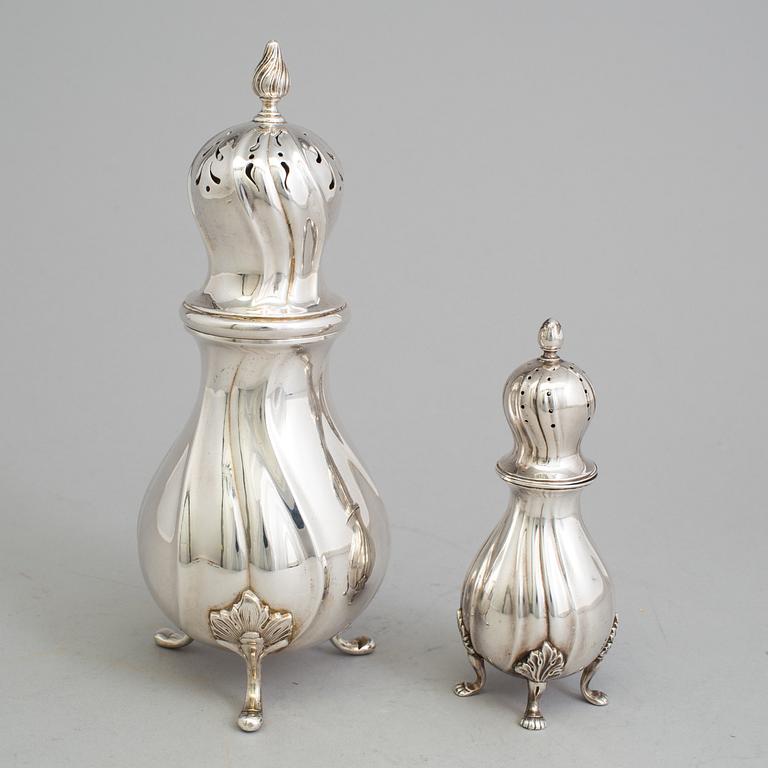 Two 20th century silver casters, one marked CG Hallberg, Stockholm 1938 and one with Swedish import marks.