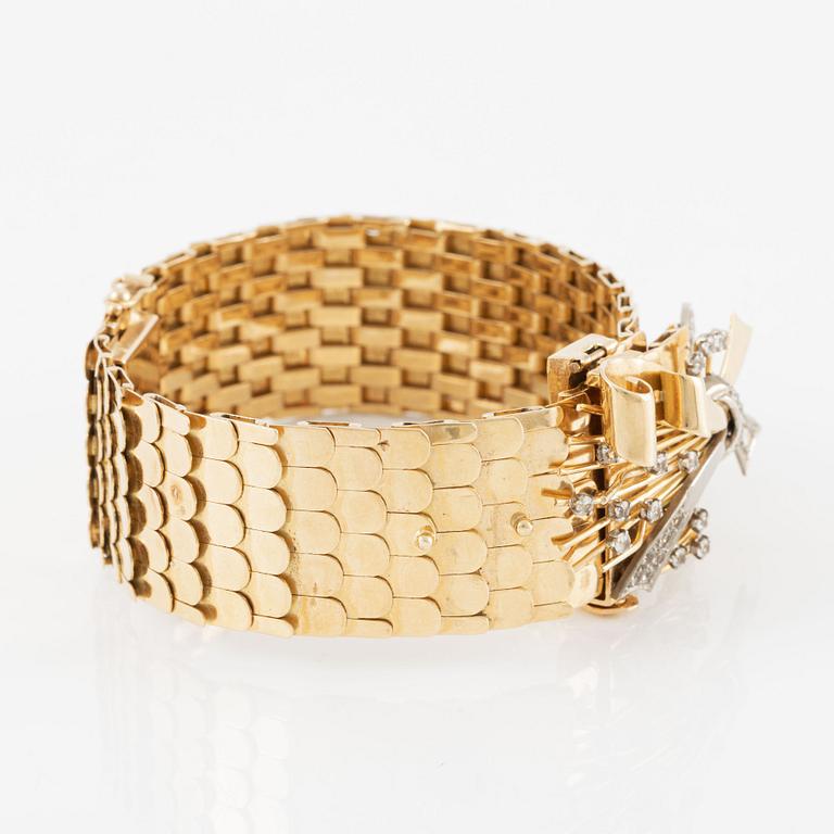 Armband 18K guld med vita stenar.