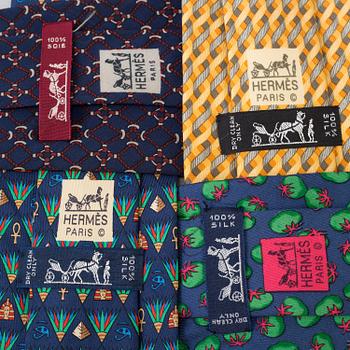 A set of four silk ties by Hermès.