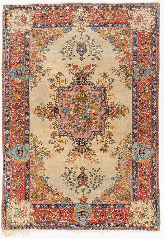A semi-antique Tabriz carpet, West Persian, c. 250 x 175 cm.