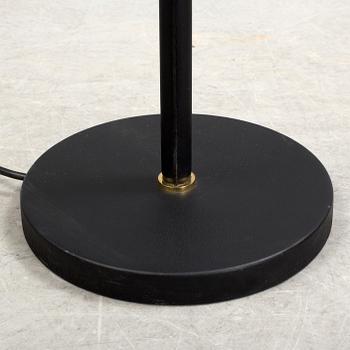 An "A 810" floor lamp by Alvar Aalto, Artek.