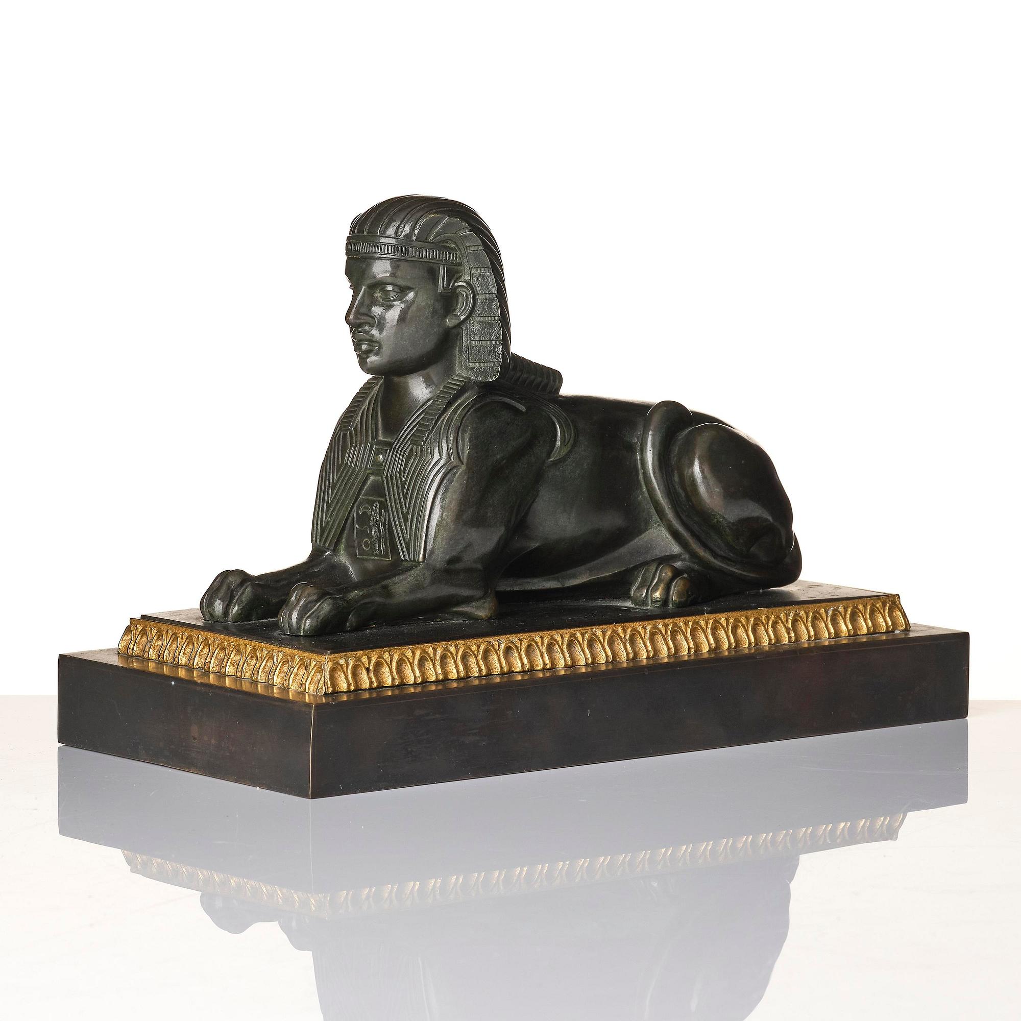 A French Empire bronze sfinx.