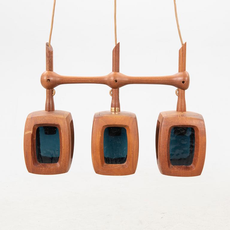 A 1960s teak ceiling pendant from Stilarmatur Tranås.