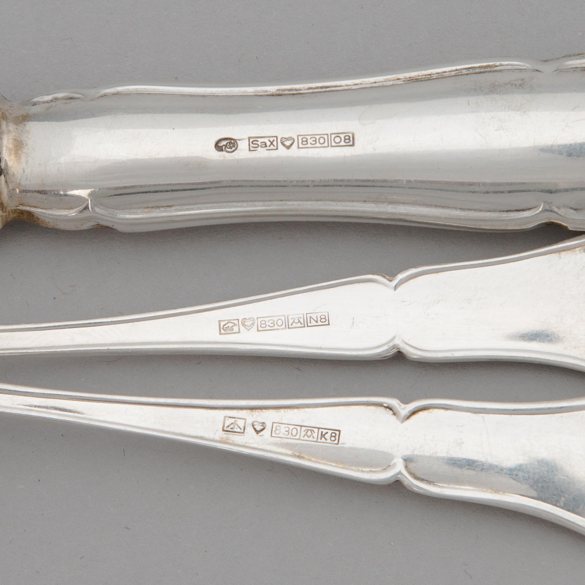 A 24-piece set of 'Chippendale' silver cutlery, Finnish hallmarks 1987-91.