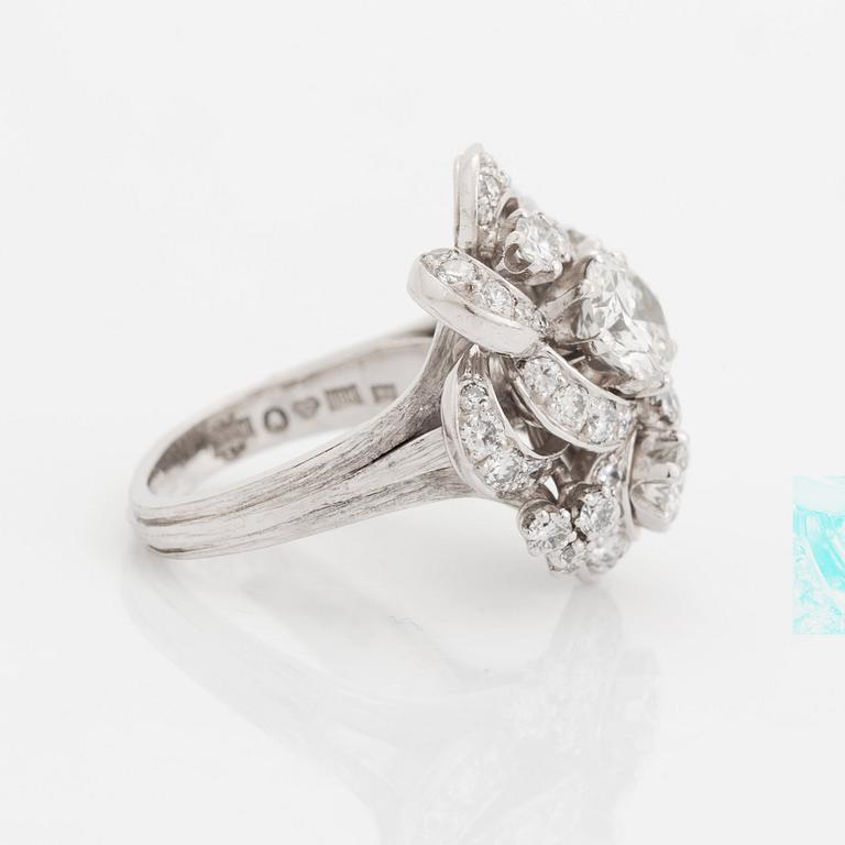 An 18K white gold WA Bolin ring set with round brilliant-cut diamonds.