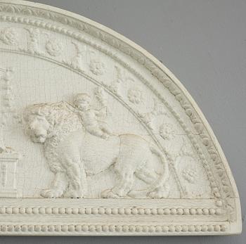 A late Gustavian carved and gesso crest, circa 1800.