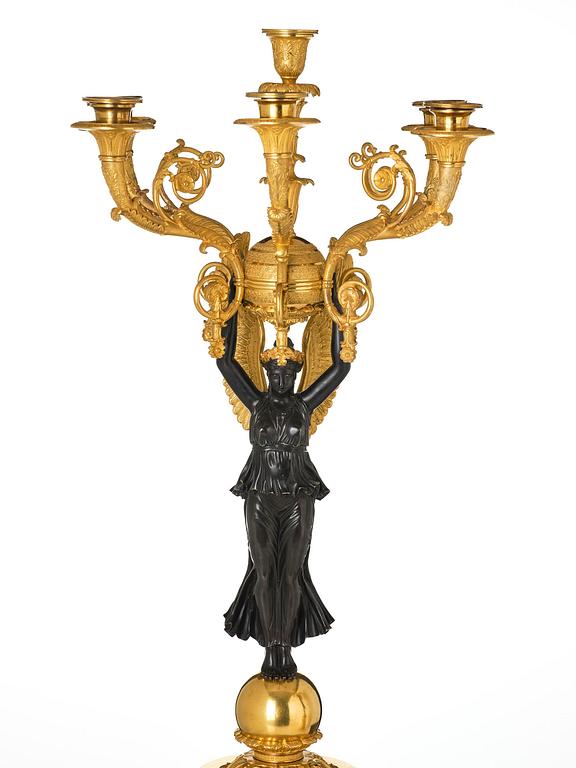 A pair of important six light Empire candelabra.