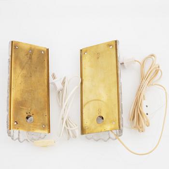 Carl Fagerlund, a pair of brass and glass wall-lights from Orrefors, 1950's/60's.