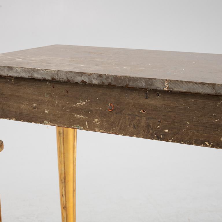 A console table with stone top.
