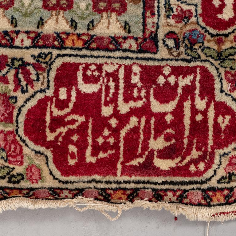 A rug, Antique Kerman Laver figural, ca 81 x 60 cm.