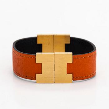 Hermès, a 'Lurie' leather bracelet.