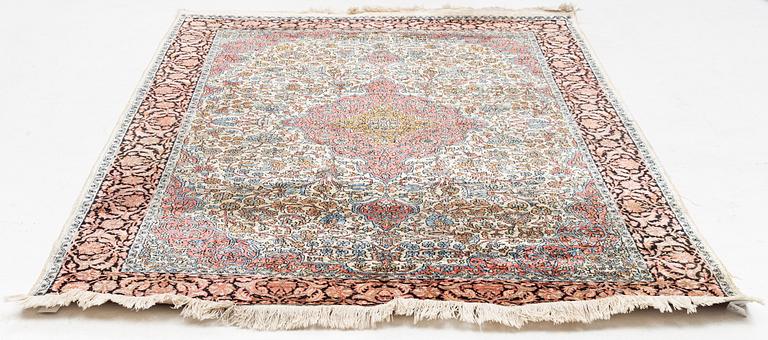 A silk rug, Kashmir, approx. 270 x 187 cm.