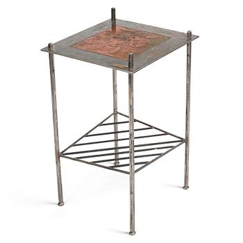 64. Madeleine Pyk, & Per Baker, a table with a copper etching, 1960s and 21st century.