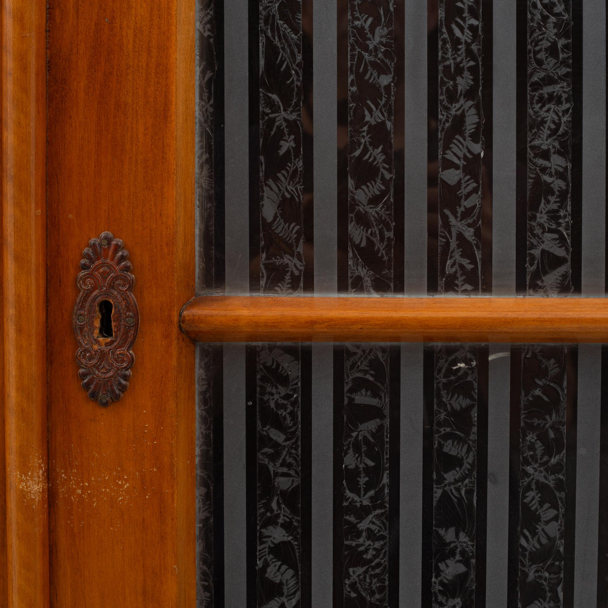A bookcase, circa 1900.