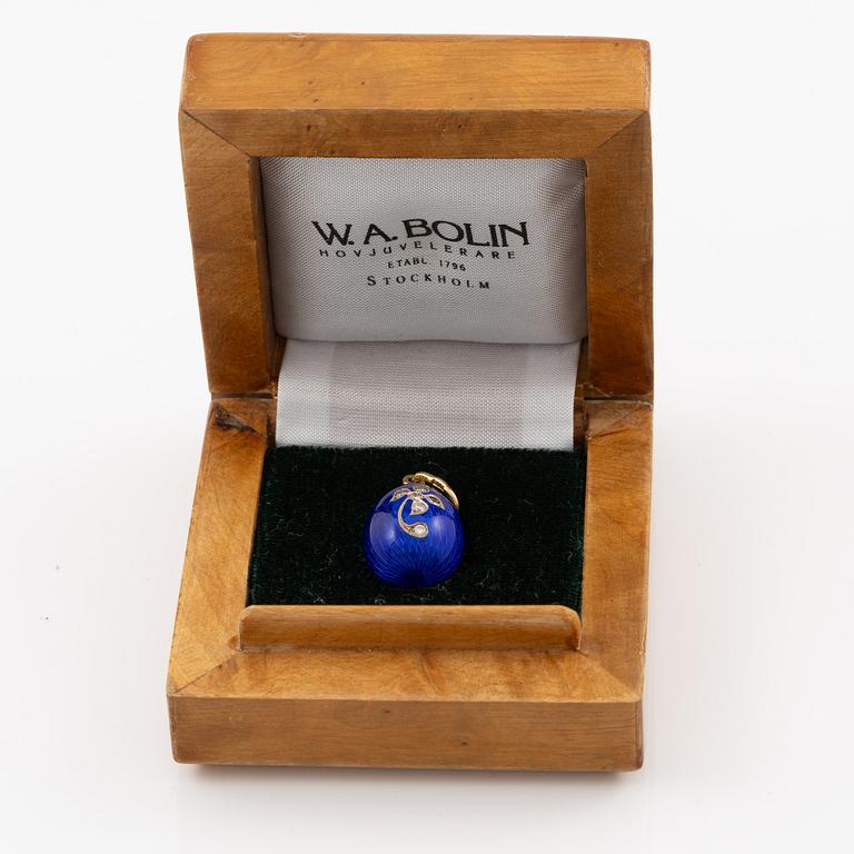 A W.A. Bolin pendant in the form of an egg, 18K gold and silver with enamel, set with round brilliant-cut diamonds.