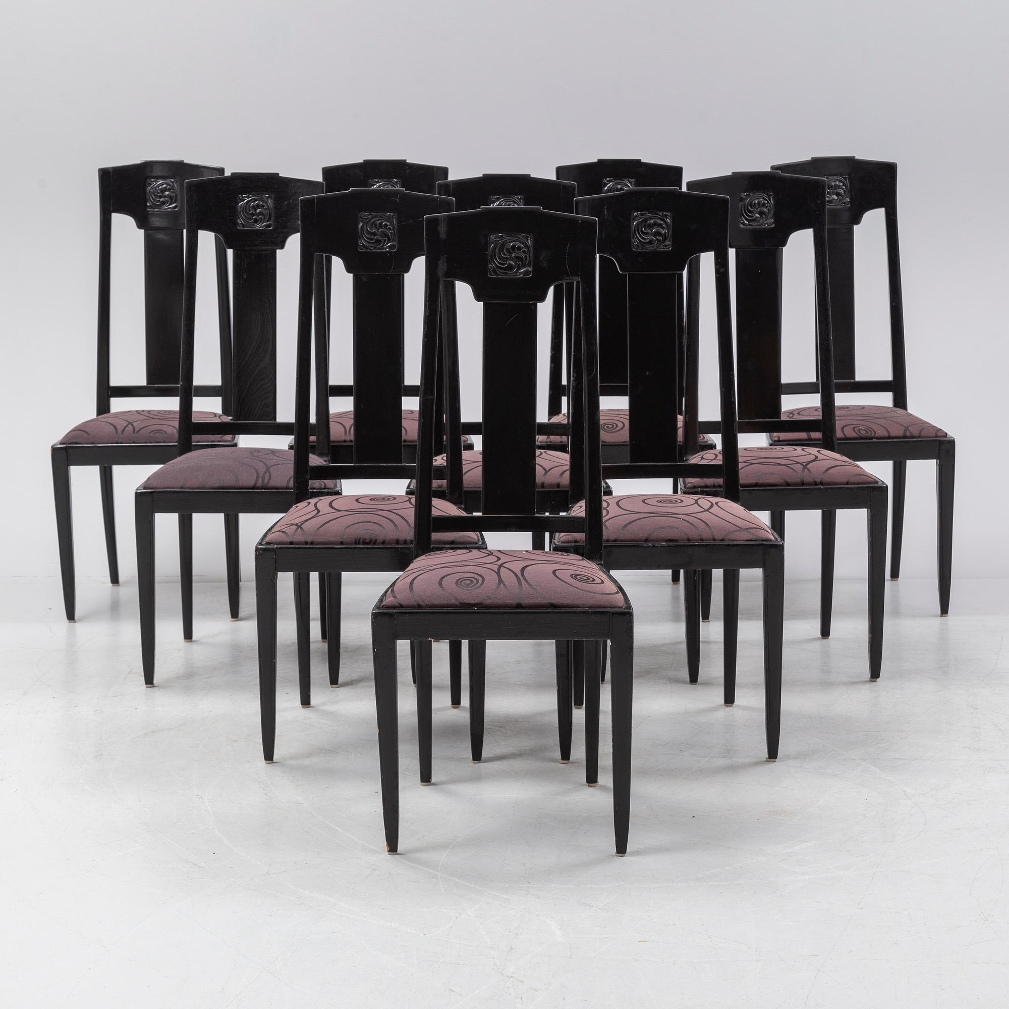Ten carved oak chairs, Myrstedt & Stern A.-B., Stockholm, early 20th Century.